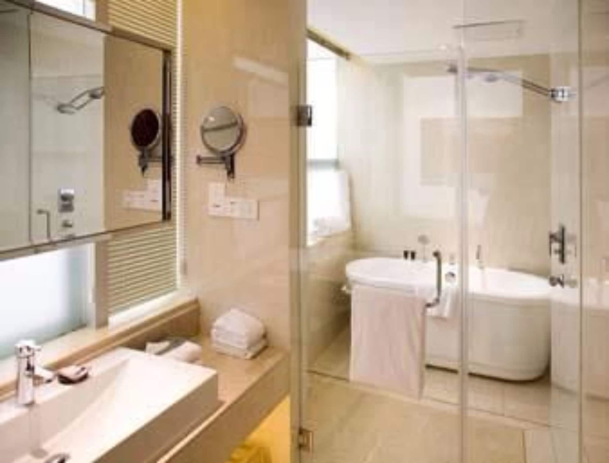Ramada Zibo Hotel Quarto foto