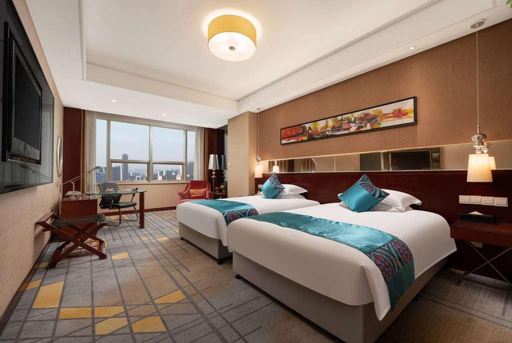 Ramada Zibo Hotel Quarto foto